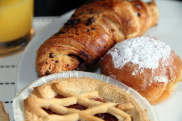 Breakfast,orange juice and pastries