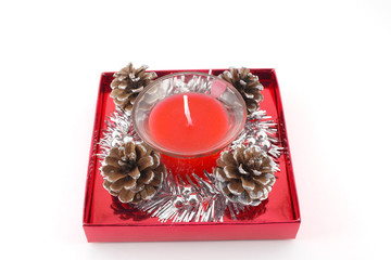 Christmas decoration with pine cone and candle