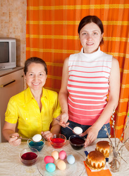 Two women coloring Easter Eggs
