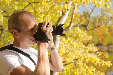man makes in autumn photo