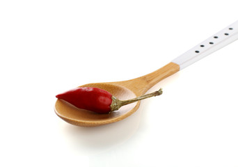 Spoon with fresh red chilli