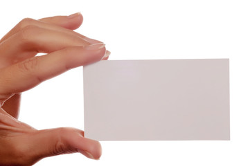 Blank business card in a hand of young woman, close-up