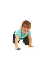Boy crawling and play with small  toy car