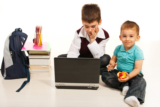 Student boy and hi little borther