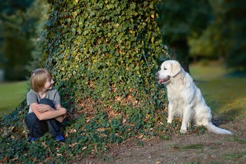 Boy with his dog in the park