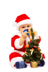 Small Santa Claus with fir-tree it is isolated