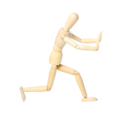 wooden mannequin pushing something isolated on white background