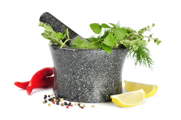 mortar with fresh herbs