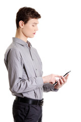 Young businessman using tablet computer