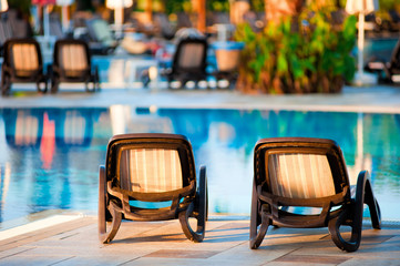 Chaise lounge by the pool to relax in the villa.