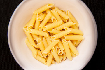 Yellow macaroni, vermicelli food background