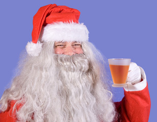 Santa Claus holding a teacup
