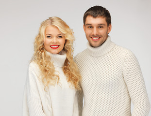 family couple in a sweaters