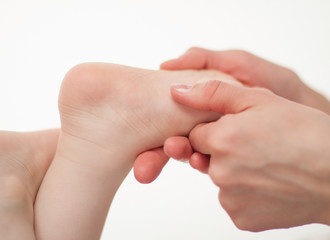 The therapeutic massage for a baby's feet