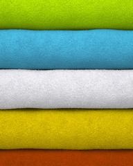 Colorful towels stacked on each other