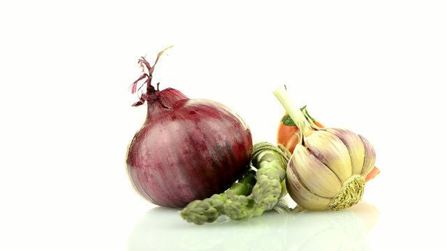 Onion, tomato and garlic still life
