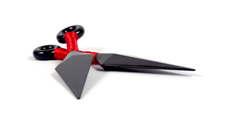 To throw ninja weapons isolated on white background