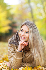 Relaxed woman in autumn