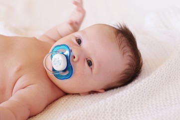 The baby with a dummy (1 month)