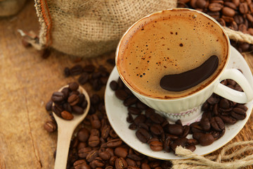 Coffee beans and cup
