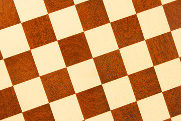 Very old wooden chess board, isolated