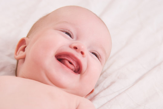 Close-up portrait of happy baby