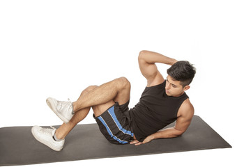 Obraz premium Man doing abdominal exercise