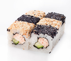 sushi roll with fish and cucumber in sesame