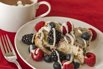 Fresh berries with coffee cake and hot chocolate