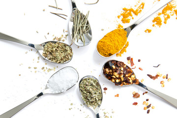 Spices and herbs on white background