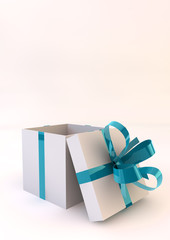 White gift boxes with turquoise ribbons