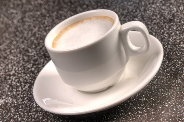 Cup of steaming hot coffee