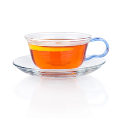 Glass cup of tea with lemon slice. Isolated on white background