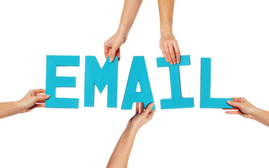 Female hands holding letters EMAIL