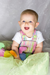 Fototapeta premium Infant sitting and smiling