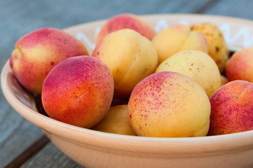 Peaches in plate close-up