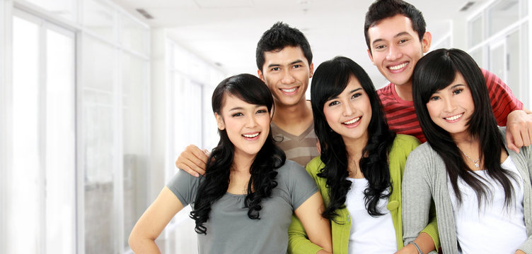 group of happy smiling friends