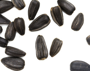 black seeds on a white background. macro