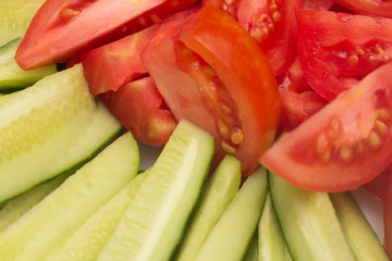 sliced ​​cucumbers and tomatoes