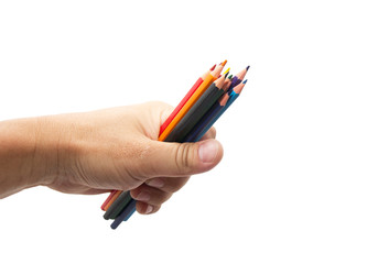 colorful pencils in hand on a white background