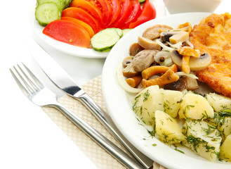 Roast chicken cutlet with boiled potatoes and  mushrooms