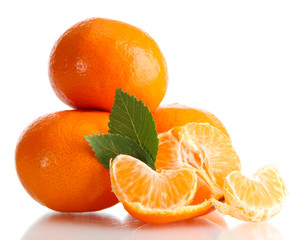 Ripe tasty tangerines isolated on white