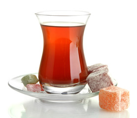 glass of Turkish tea and rahat Delight, isolated on white