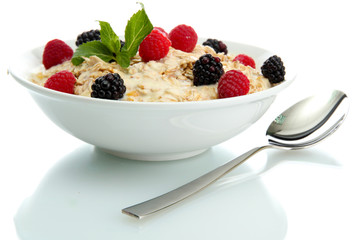 tasty oatmeal with berries, isolated on white