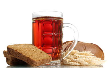 tankard of kvass and rye breads with ears, isolated on white