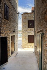 Narrow old street in stone, Croatia