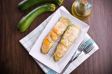 Stuffed zucchini halves.
