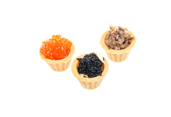 Canapes with red, black and mushroom caviar