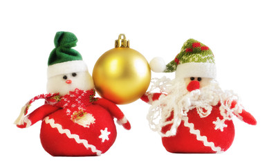 christmas ball in equilibrium between santa and snowman