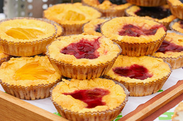 Fresh cakes with strawberry and peach